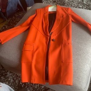 Lightly used orange Proenza Shoulder coat